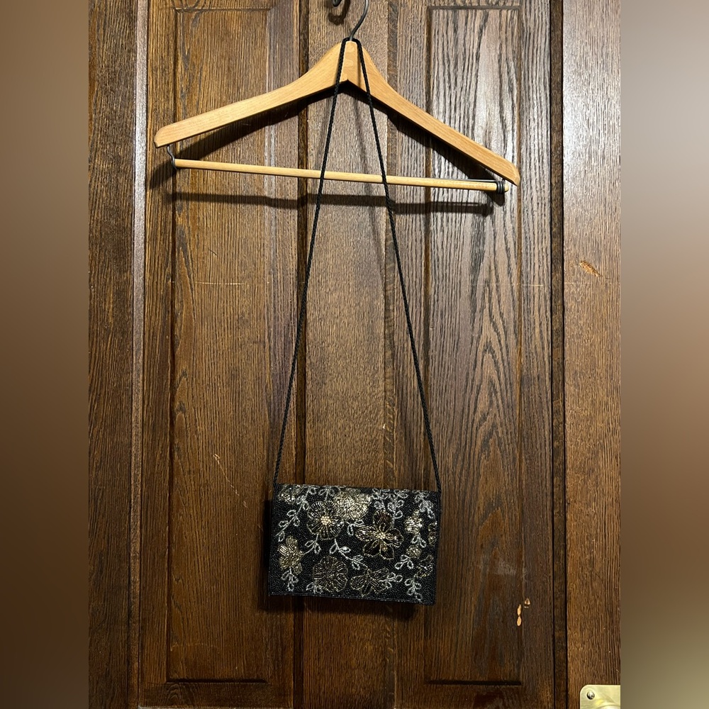 Vintage Black and Gold Clutch with Sophisticated Design